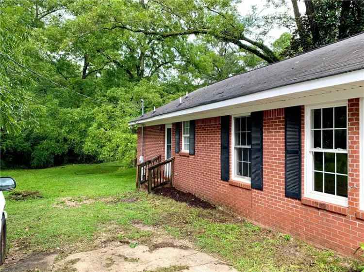 Buy Home Near Jordan Hare Stadium with Game Day Features