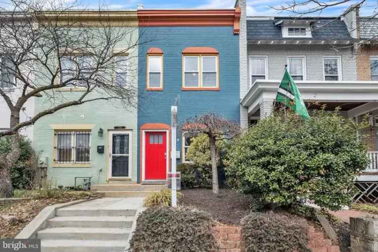 Buy all brick home with garden in Capitol Hill