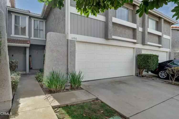 Buy Townhouse with Modern Features and Spacious Backyard