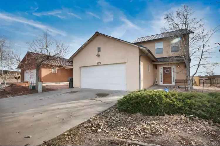 Buy 1.5 Story Home in Canon City with Mountain Views and 3 Bedrooms