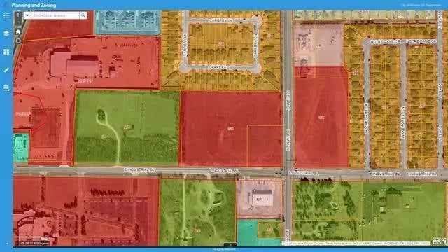 Commercial land buy opportunity in an L-shaped lot with potential