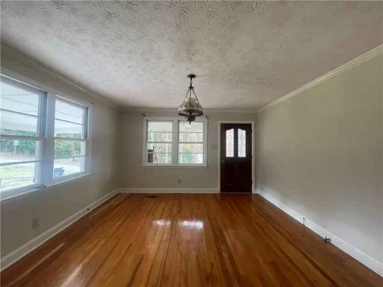 Buy Charming Home in Phenix City with Sunrooms and Workshop