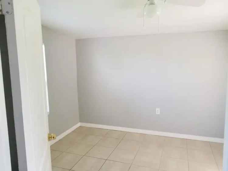 Rent 3 Bedroom 2 Bath Home Near Tamiami Trail with Pet Friendly Features