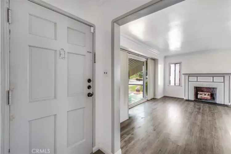 Buy Spanish stucco home in Manchester Square Los Angeles with charm and character