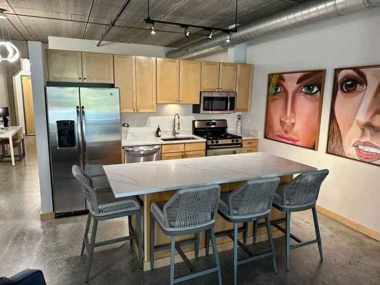 Rent 2 Bedroom Condo in North Loop with Private Patio and Amenities