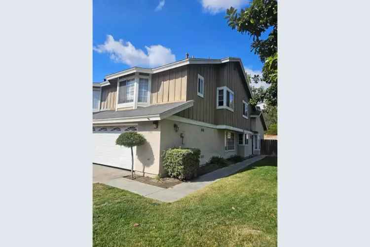 Rent spacious townhome with fenced backyard and 2 car garage