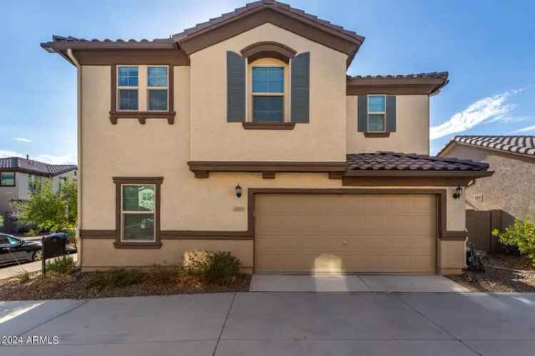 Buy spacious home in Goodyear with 4 beds, 2.5 baths and backyard