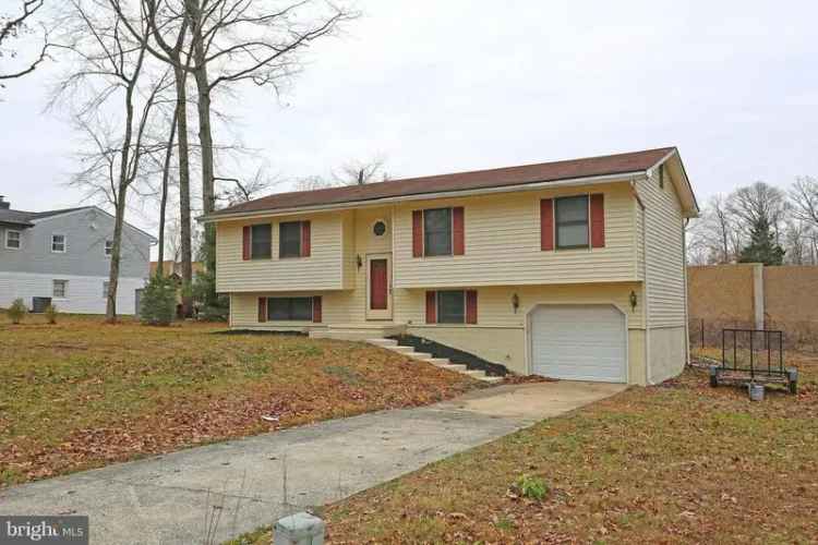 Rent Updated 4 Bedroom Bi-Level Home with Large Yard