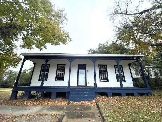 Renovated buy historic home in Phenix City with charming features