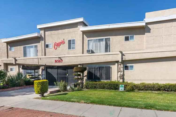 Rent Capri Apartments in Downey with Gated Parking and Laundry Facility