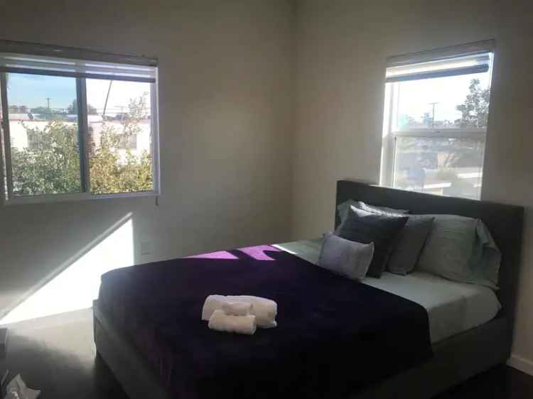 Rent Fully Furnished Apartment Unit with High Ceilings in Central Location