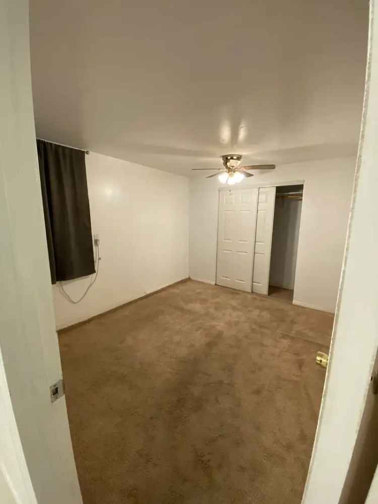 Rent Cozy 2-Bedroom Apartment with Shared Backyard