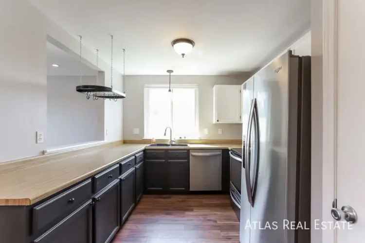 Rent a 3 Bedroom Modern Home in Aurora with Gourmet Kitchen and Yard