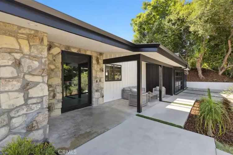 Buy Mid Century House in Woodland Hills with Modern Amenities and Pool