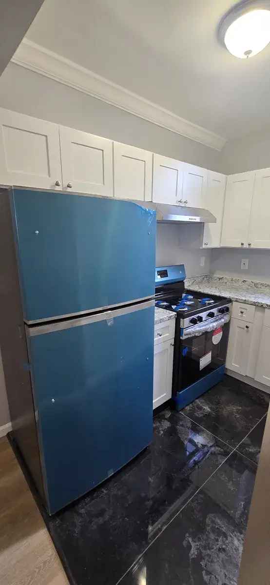 Rent Newly Renovated Apartment Unit with Private Backyard