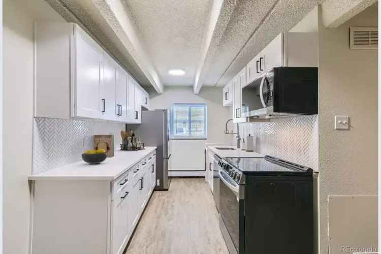 Buy Condo in Lowry with Modern Upgrades and Great Location