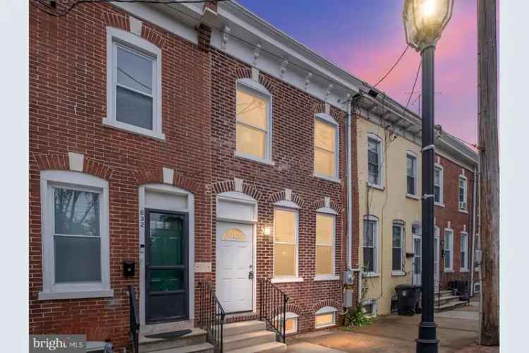 Beautiful renovated row home for sale near Maurice Pritchett Jr Academy