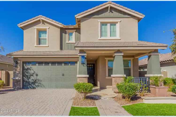 Buy two-story home in Estrella Commons with 5 beds and 4 baths