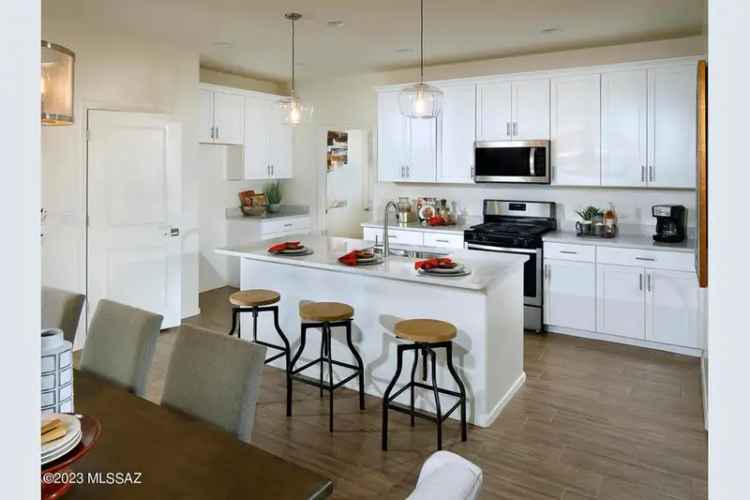 Buy brand new energy efficient home with loft and community amenities in Sahuarita Arizona