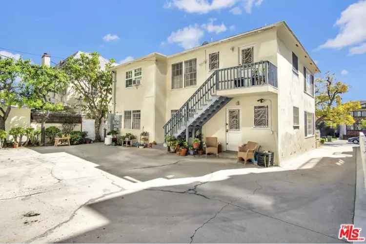 Rent Four Unit Apartment Building in Westwood with Upgraded Features