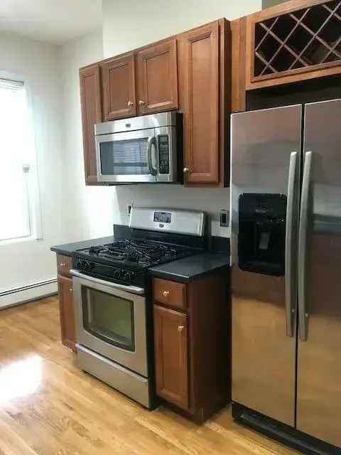 Rent Apartment Unit with 5 Beds and 2 Baths Featuring Central Air and Laundry