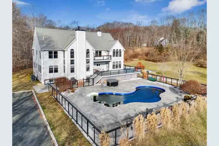 Custom colonial buy in private location with pool and exceptional features