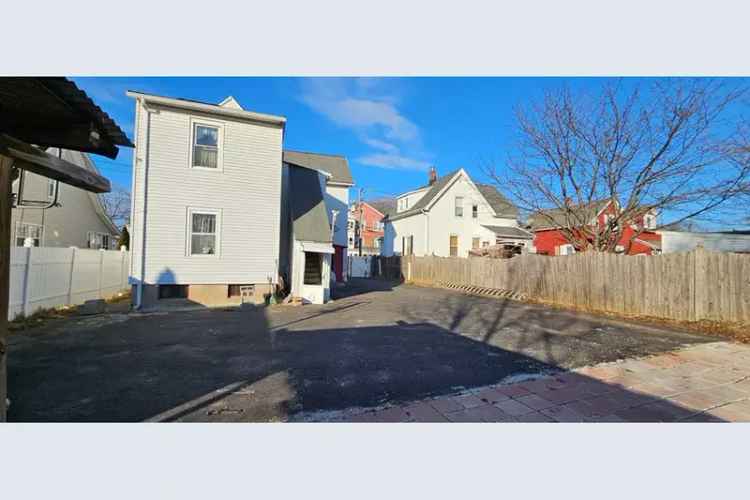 Buy 2 Family Home West Hartford with Spacious Rooms and Backyard