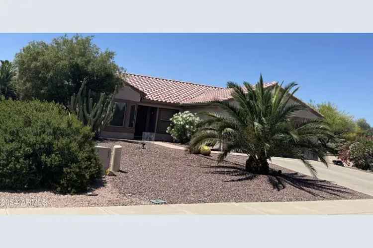 Buy House in Sun City Grand Community with Spacious Backyard and Modern Features