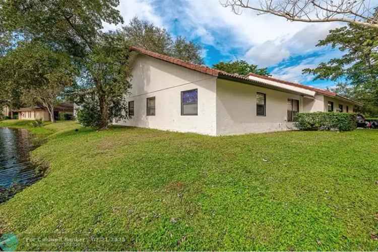 Invest in Lakefront 4-Plex in Coral Springs with High Potential