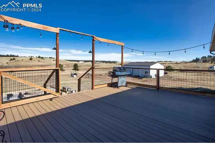 Buy single-level home in Colorado with updated features and spacious lot