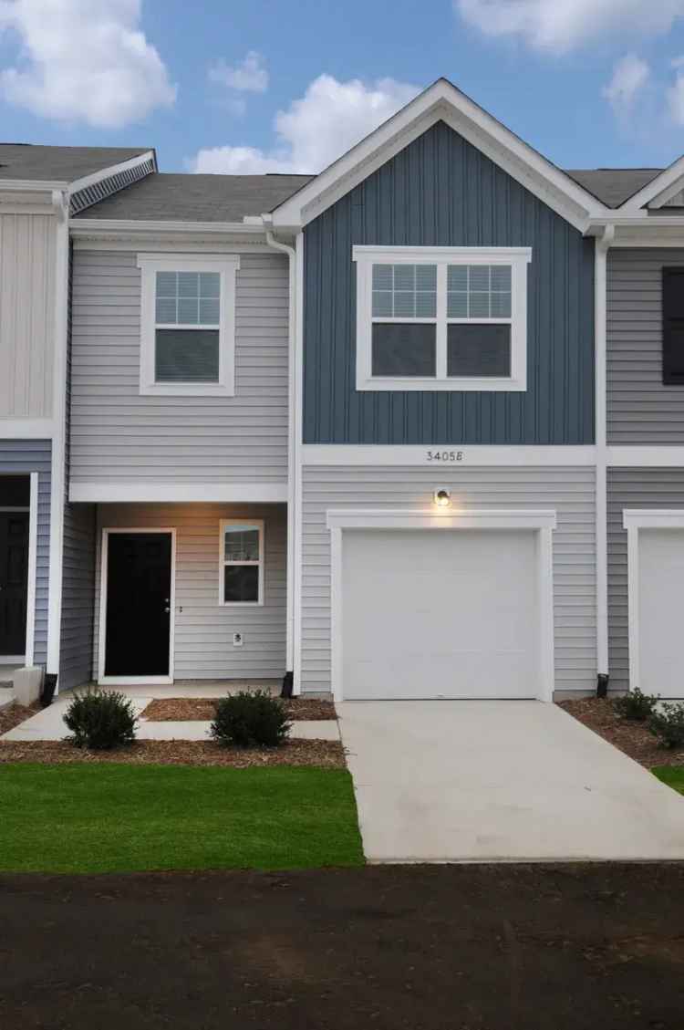 Rent Modern Townhome in Prime Location with Spacious Features