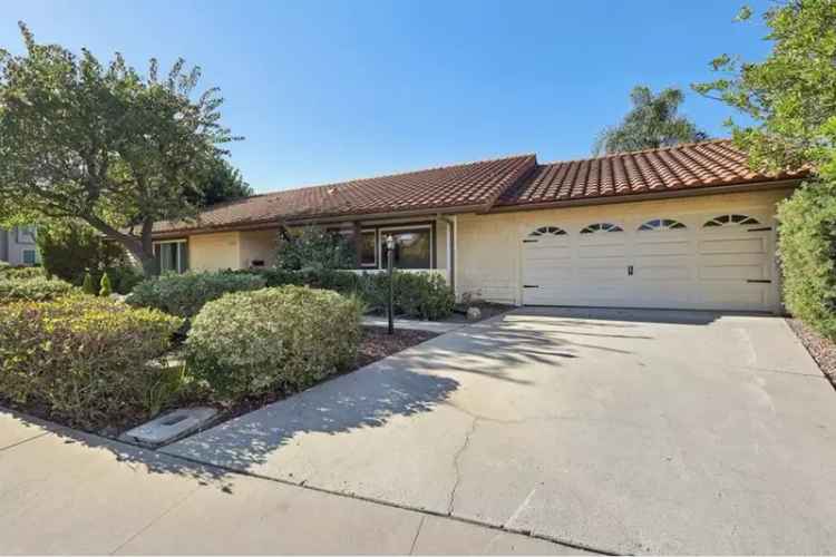 Buy single level home in Rancho Bernardo with updated features and community perks