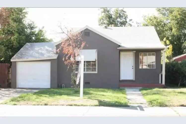 Buy House in Sacramento with New Flooring and Updated Fencing