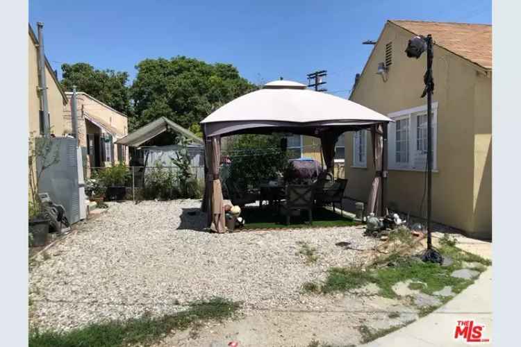 Motivated Seller Buy Duplex Lot with Tenants in Attractive Location