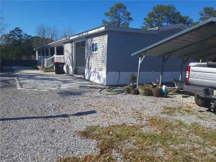 Buy manufactured home in Tillmans Corner with spacious outdoor features