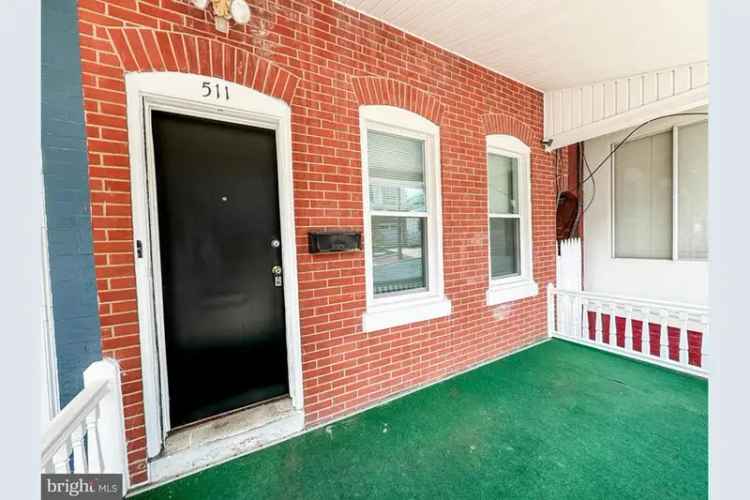 Renovated townhouse for sale in Wilmington with 4 bedrooms and backyard