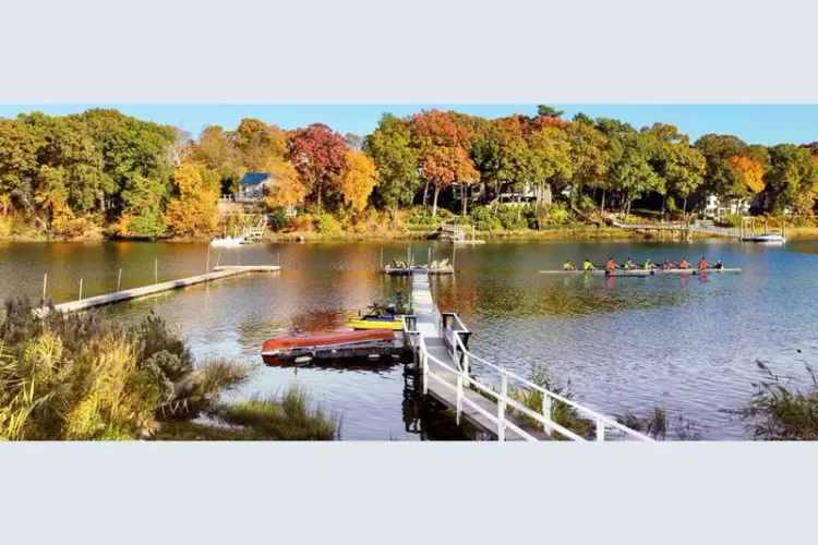 Waterfront home for sale with private dock near restaurants and more