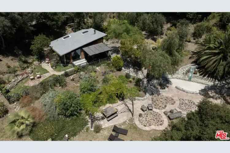 Buy Artistic Retreat with Mountain Views in a Scenic Location