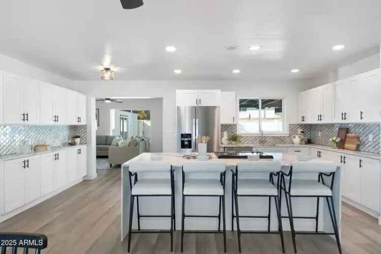 Rent Phoenix home with pool and backyard oasis near mountain views