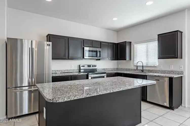 Buy 4 Bedroom Home in Maricopa with Spacious Backyard and Modern Amenities