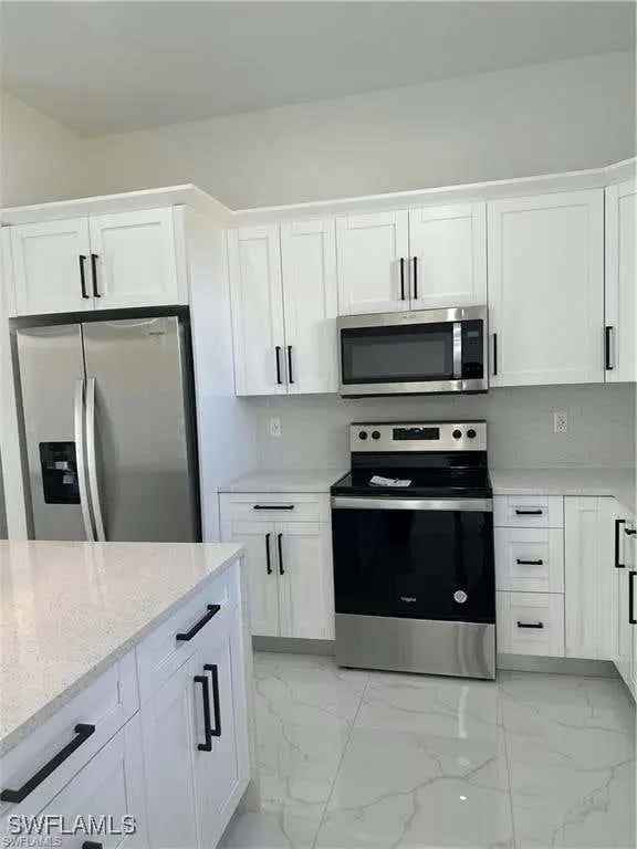 Rent New 4 Bed 2 Bath Home in SW Lehigh Acres with Modern Features