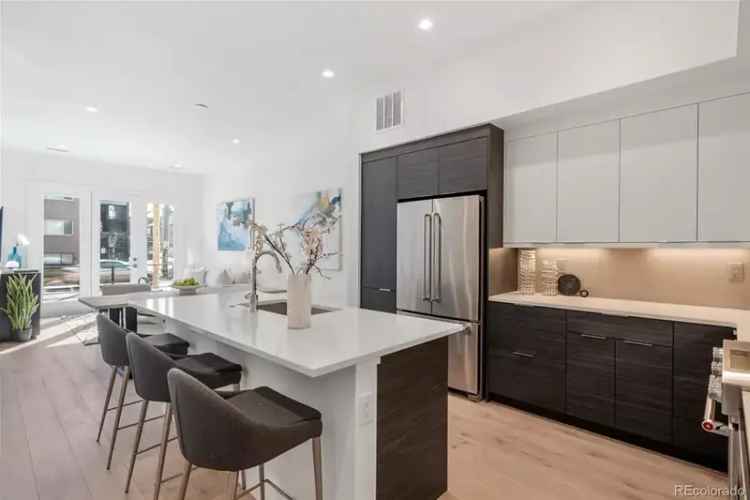 Buy Modern Townhome in Denver Uptown with 3 Bedrooms and Rooftop Deck