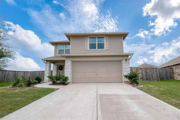 Buy two-story home with spacious kitchen in charming neighborhood