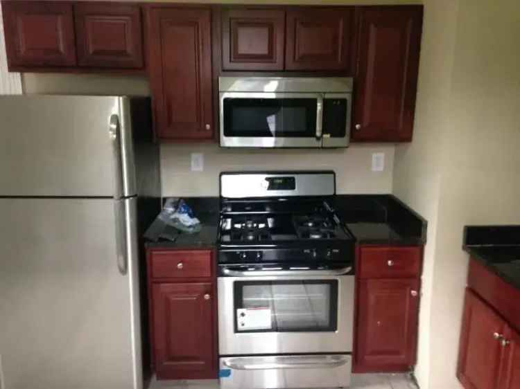 Rent Spacious Apartment Unit with Private Backyard Near BU and BC