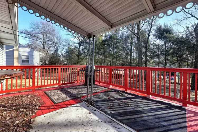 Buy beautiful ranch home in serene neighborhood with orchard and large deck