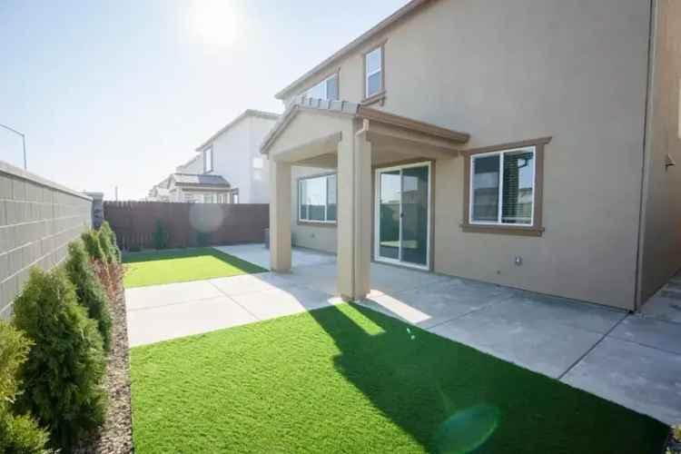 Buy New Home with Solar in Great Location and Low Maintenance Yard