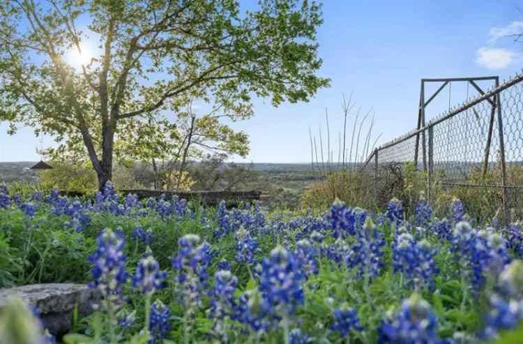 Buy land in Dripping Springs with stunning views and owner financing