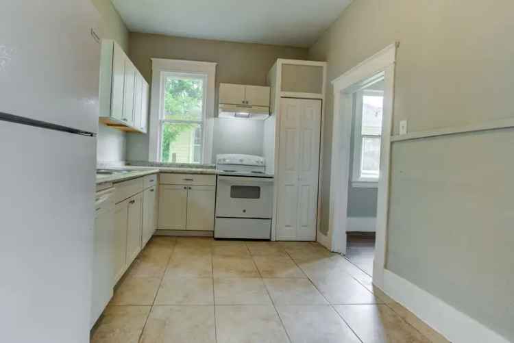 Rent Charming Two Bedroom Home with Front Porch and Hardwood Floors