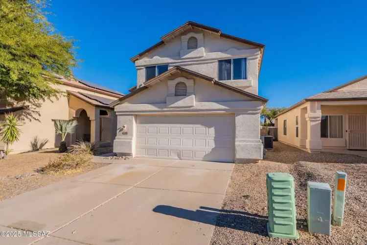 Buy spacious home in Rita Ranch with 4 bedrooms and 3 bathrooms