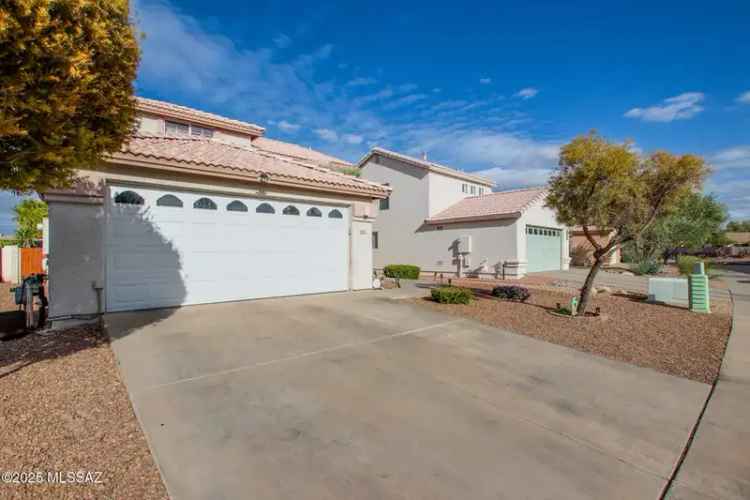 Buy Two Story Home in Rita Ranch with Cozy Features and Fruit Trees